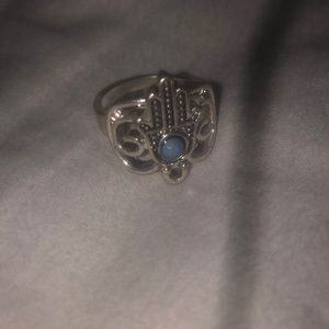 Size 4 silver ring with a pinch of blue